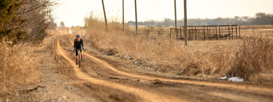 Matt riding drop bar bike on rolling gravel road