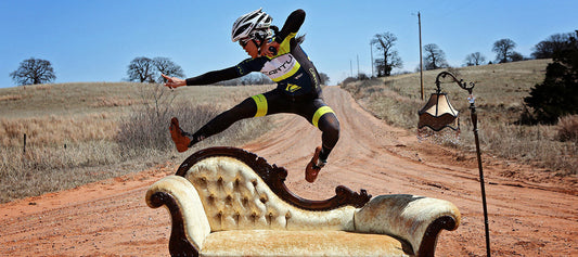 Racer jumping doing flying side kick for Chaise photo