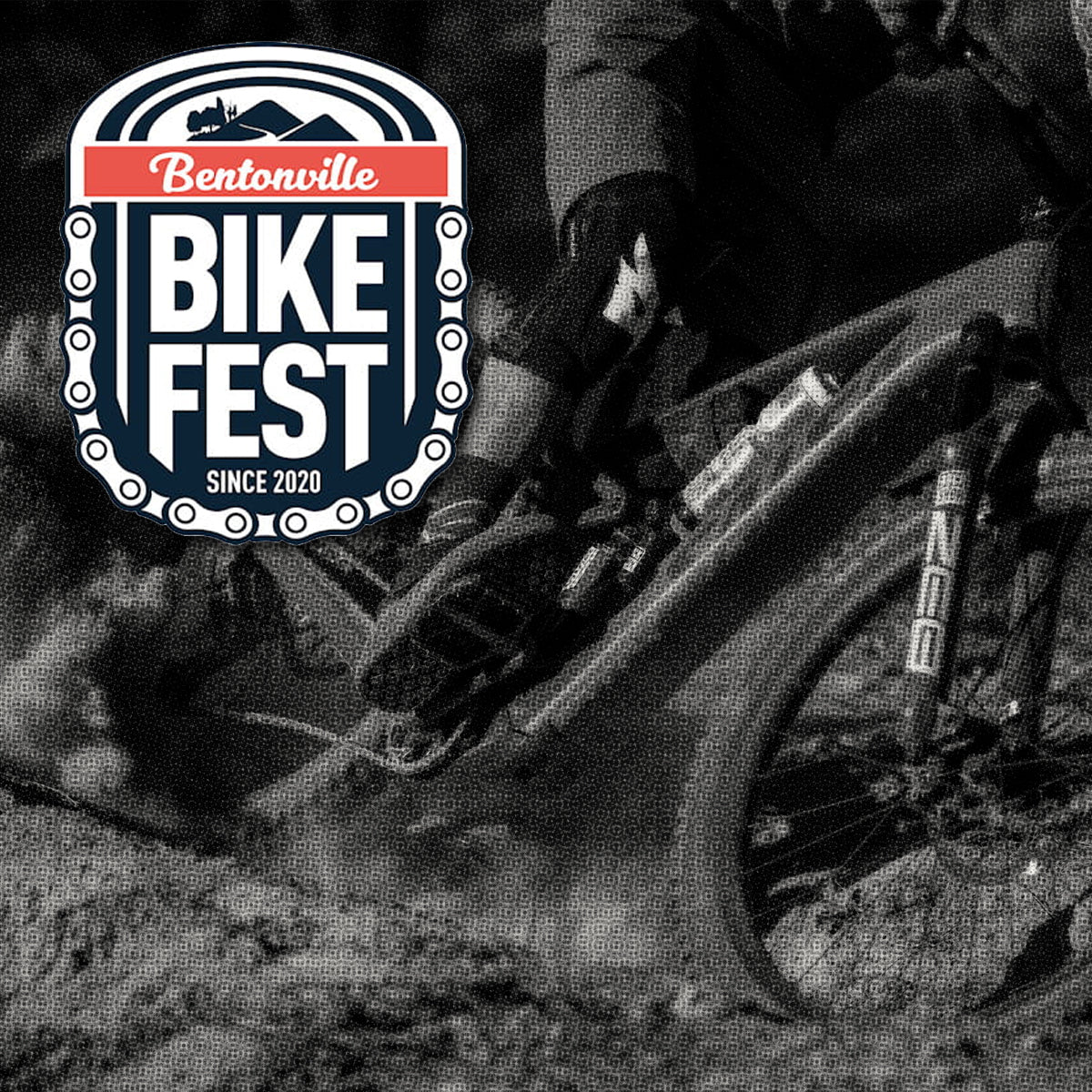 Logo for the Bentonville Bike Fest over a black and white closeup image of a mountain biker.