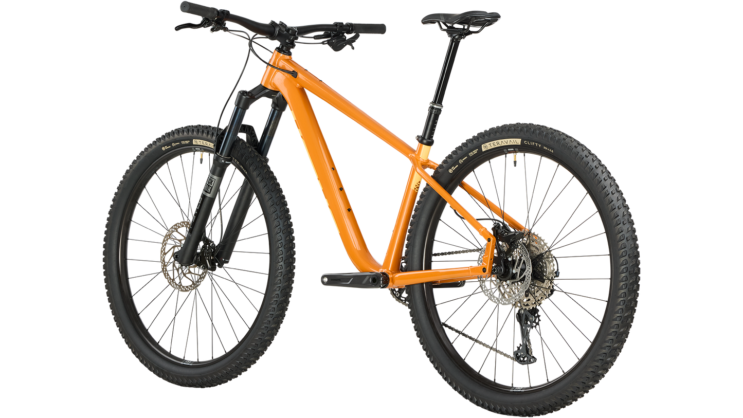 Salsa Timberjack SLX 29 orange mountain bike rear three-quarter view