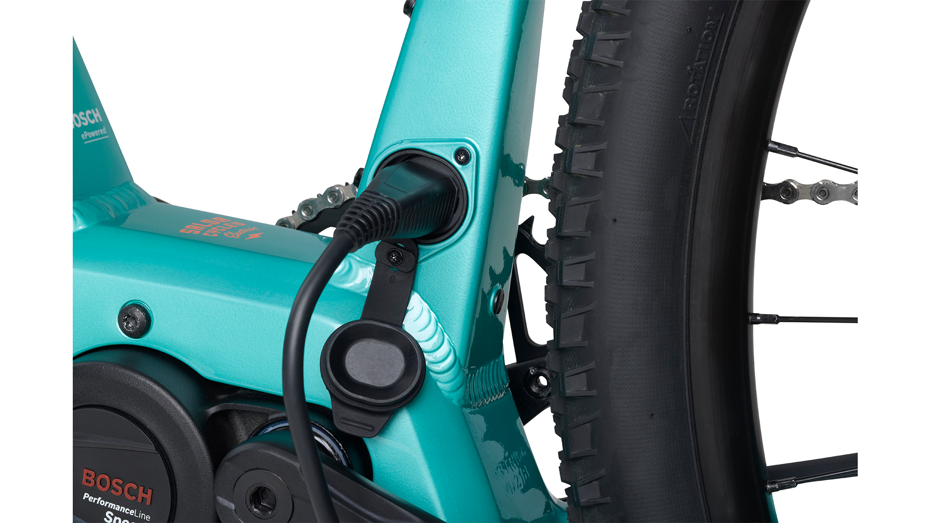 Salsa Tributary Ebike GRX 600 teal Bosch motor charging port plugged in on white background